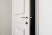 Contemporary white entrance door and hardware