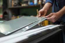 Specialist processing a glass panel